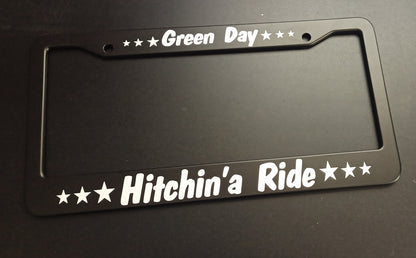 Green Day Hitchin’a Ride Black Plastic or Aluminum License Plate Frame Truck Car Van Décor Car Accessories New Car Gifts Metallic Frame